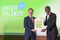 General Director Matthias Graf von Kielmansegg and Green Talent Chukwuebuka Christopher Okolo
